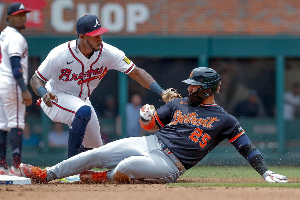 Detroit Tigers' Gleyber Torres (25) is tagged out by Atlanta Braves shortstop Jorge Mateo (2)
