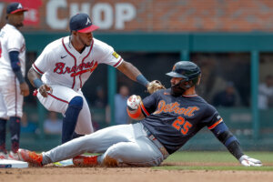 Detroit Tigers' Gleyber Torres (25) is tagged out by Atlanta Braves shortstop Jorge Mateo (2)