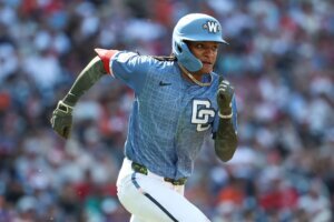 Washington Nationals' CJ Abrams runs after hitting a double