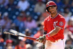 Washington Nationals' Daylen Lile reacts after he struck out