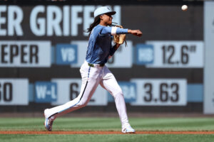 Washington Nationals shortstop CJ Abrams throws to first for an out