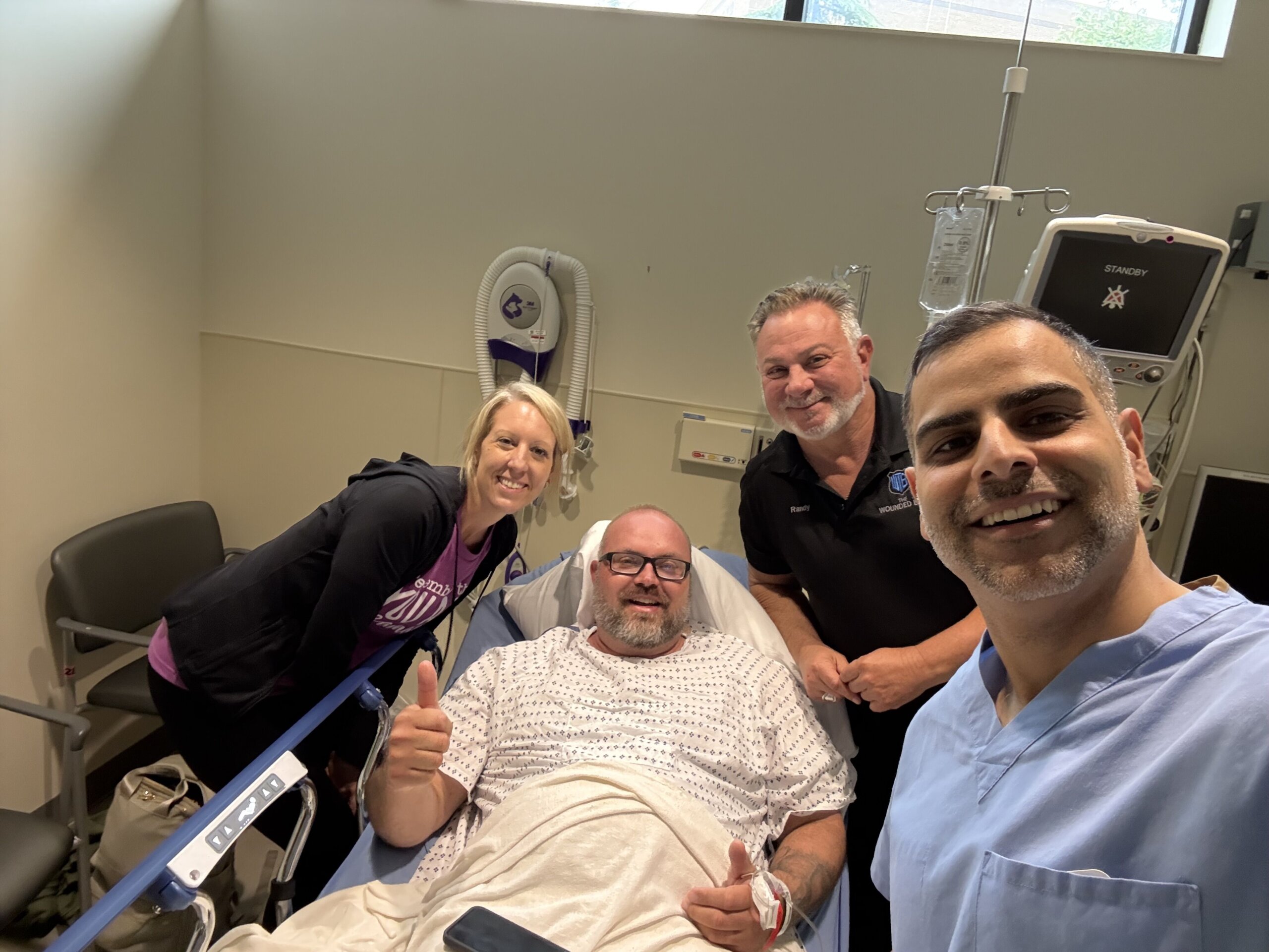 Dr. Jazini, Tim, Chelsea and Randy before surgery