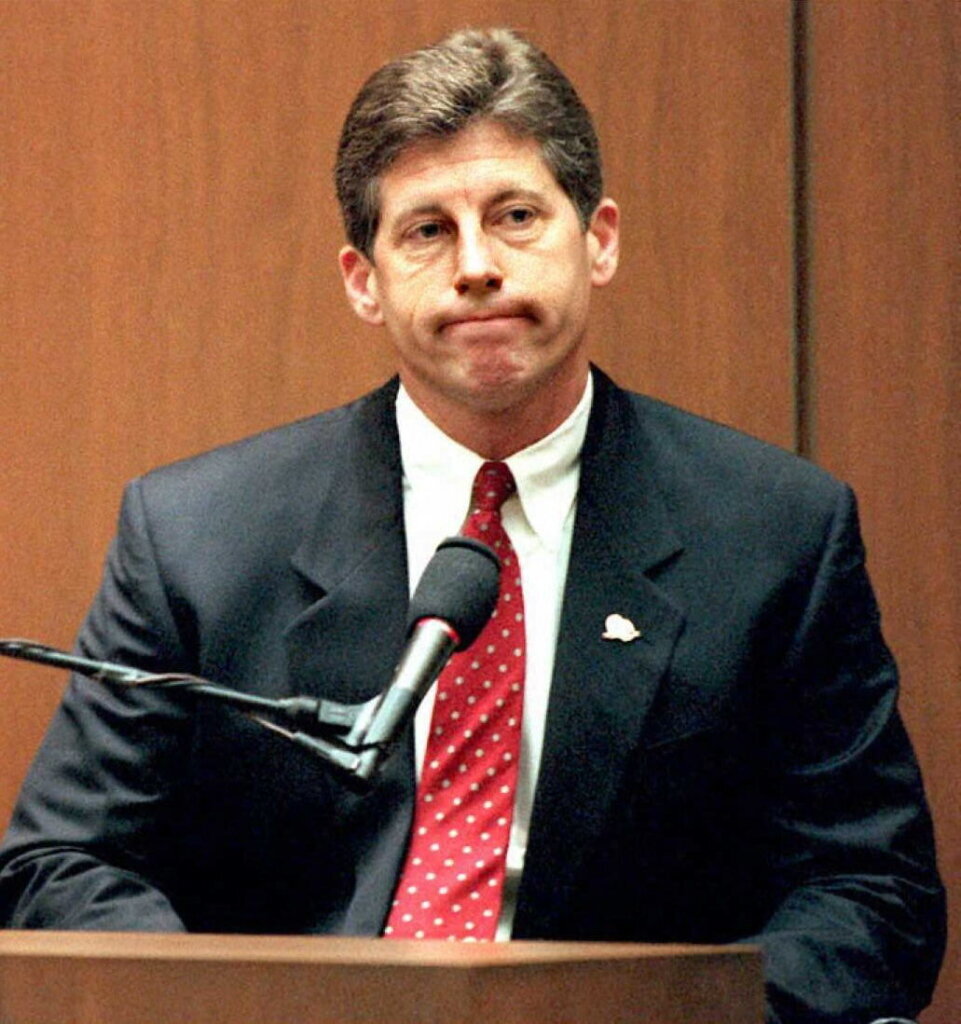 Los Angeles Police Detective Mark Fuhrman sits on the witness stand in the O.J. Simpson double murder case. Former Los Angeles police detective Mark Fuhrman, who was convicted of lying during testimony at the O.J. Simpson murder trial, has died. He was 74. (Photo by Kim Kuish/Pool/AFP via Getty Images)

&nbsp;