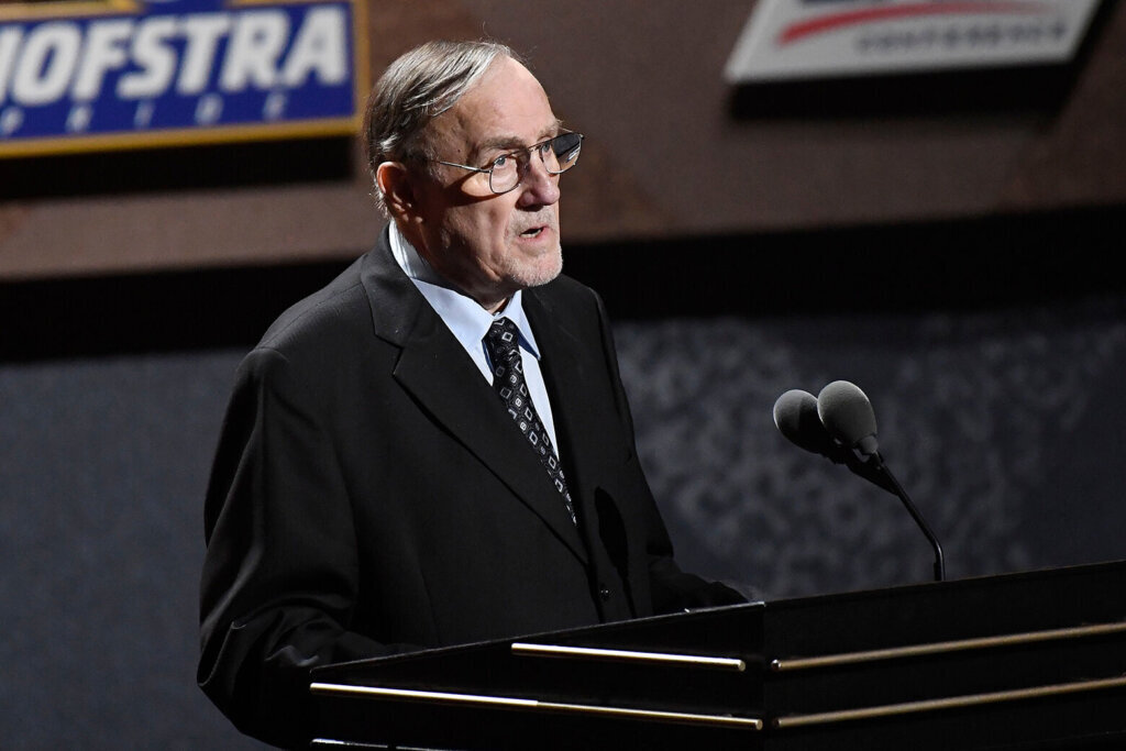 Rick Adelman speaks during the 2021 Basketball Hall of Fame Enshrinement ceremony, Sept. 11, 2021, in Springfield, Mass. Rick Adelman, a Basketball Hall of Fame inductee who played for seven NBA seasons before becoming one of the game’s all-time winningest coaches, has died, the National Basketball Coaches Association announced Monday. (AP Photo/Jessica Hill, File)
