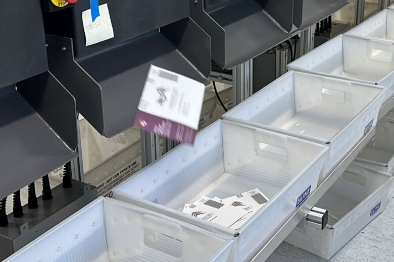 A sorting machine separates sample ballots