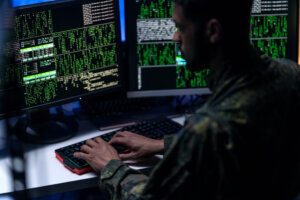 Hacker in military uniform