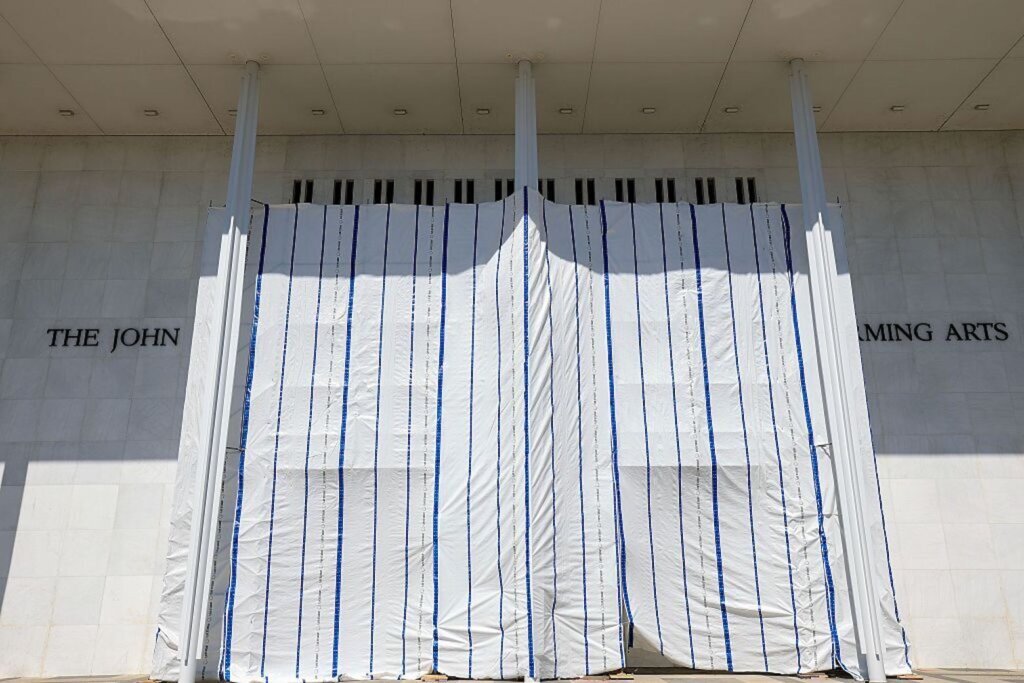 Tarps are hung on scaffolding outside The Kennedy Center on June 13, 2026. Workers removed President Donald Trump's name from the Kennedy Center. (Photo by Tasos Katopodis/Getty Images)(Photo by Tasos Katopodis/Getty Images)