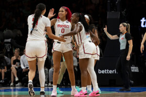 Washington Mystics players react on the floor