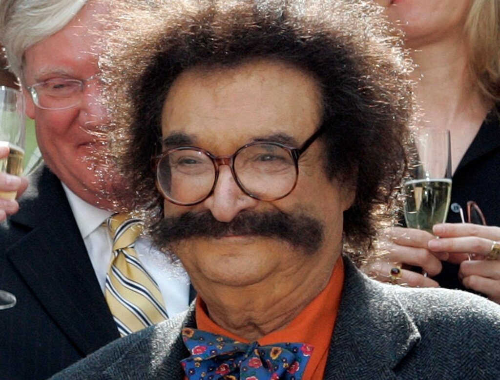 FILE - In this May 31, 2006 file photo, film critic Gene Shalit is seen during a toast with "Today" show cast and crew at the end of Katie Couric's final show, in New York. (AP Photo/Richard Drew, File)