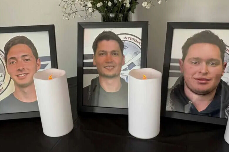 Photos at vigil of Yoav Bomrind, David Rabinovitz and Elad Naidik