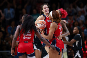 Sonia Citron (22) of the Washington Mystics celebrates with teammates