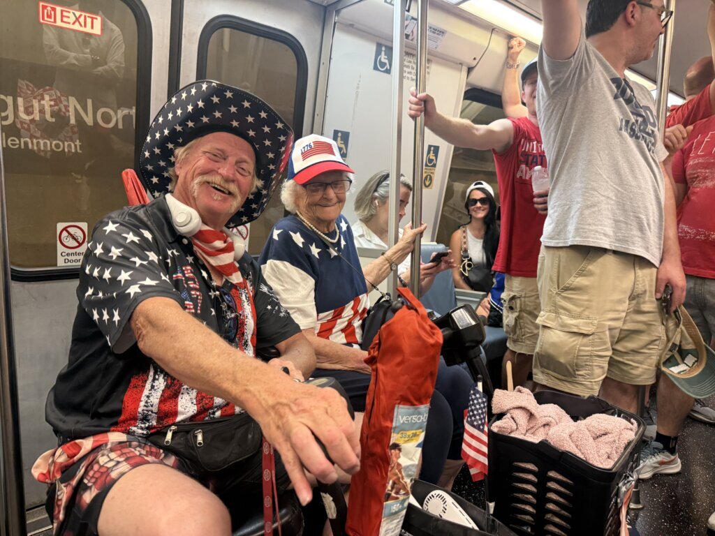 People traveling on Metrorail to D.C. to celebrate Fourth of July. (WTOP/Jimmy Alexander)