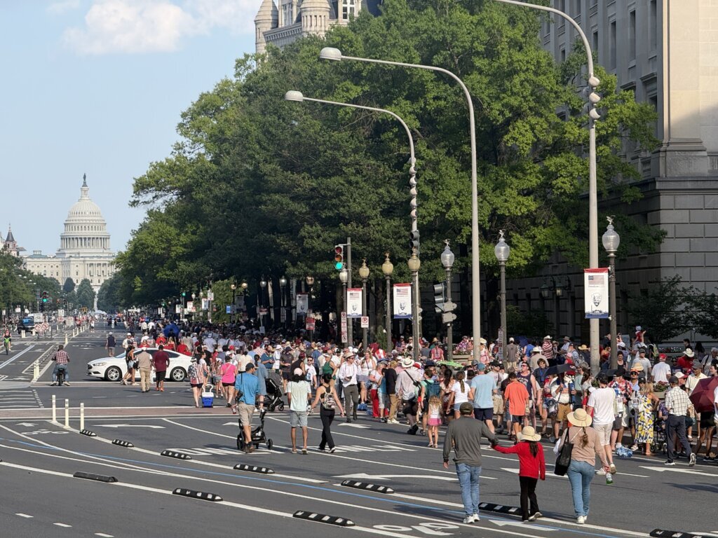 Thousands walking along Pennsylvania Avenue in Northwest D.C. on Saturday, July 4, 2026. (WTOP/Jimmy Alexander)