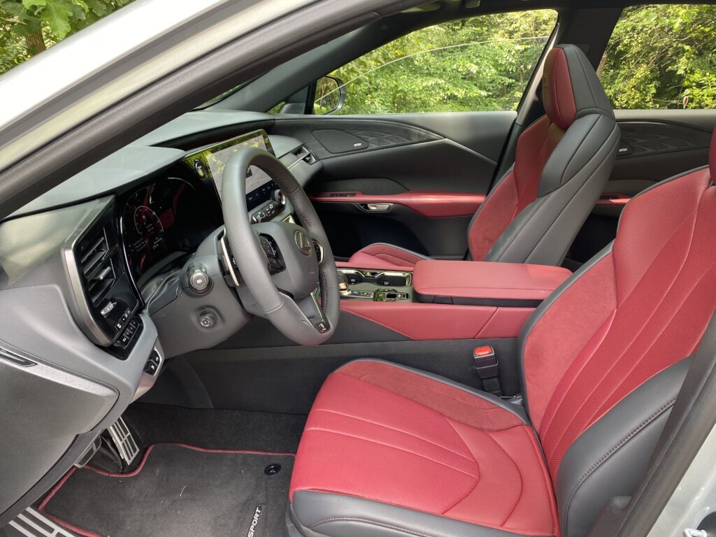 Inside, there’s eye-grabbing red and black leather. (WTOP/John Aaron)
