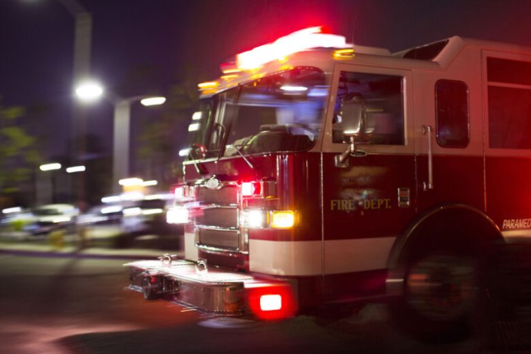 A firetruck races to the scene of an accident.