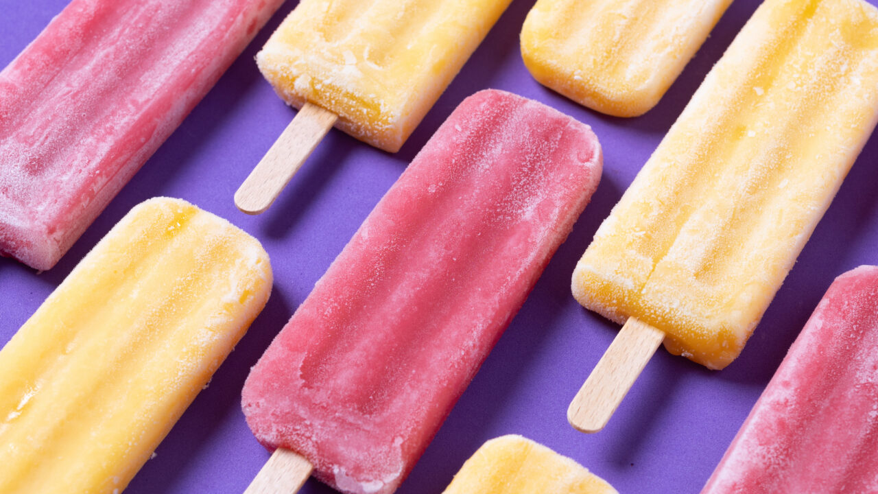 Red strawberry popsicles and yellow popsicles
