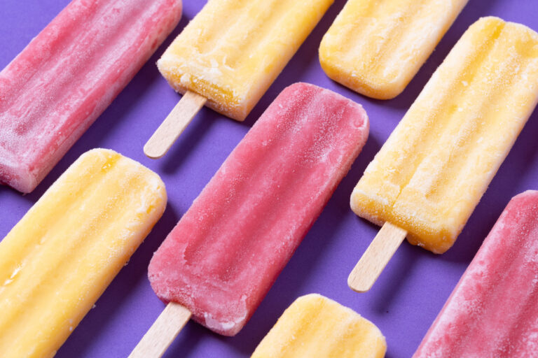 Red strawberry popsicles and yellow popsicles