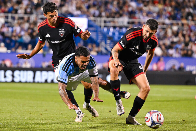 Dani Pereira (7) of CF Montréal is caught between Andre Dozzell (21) and Tai Baribo (9) of D.C. United
