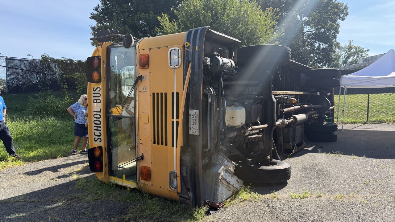 School bus on its side