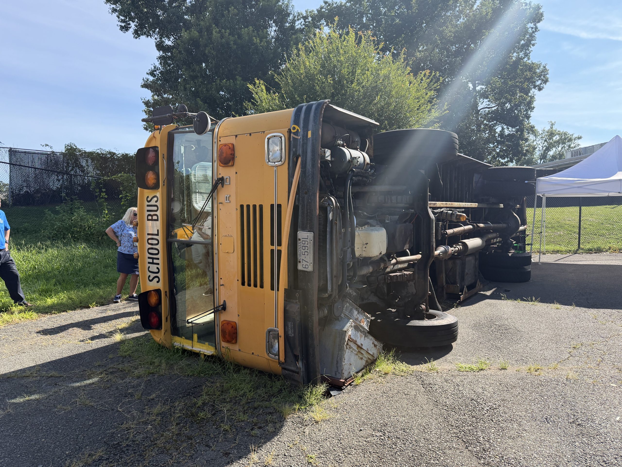 School bus on its side